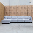 The Malta Modular Corner Lounge with Ottoman - Silver available to purchase from Warehouse Furniture Clearance at our next sale event.