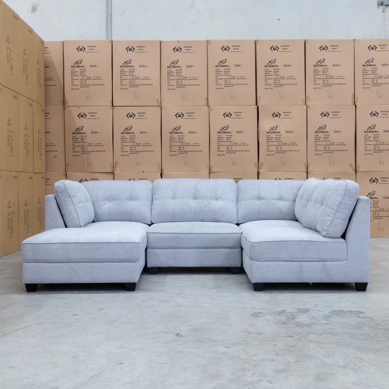 The Malta Modular Corner Lounge with Ottoman - Silver available to purchase from Warehouse Furniture Clearance at our next sale event.