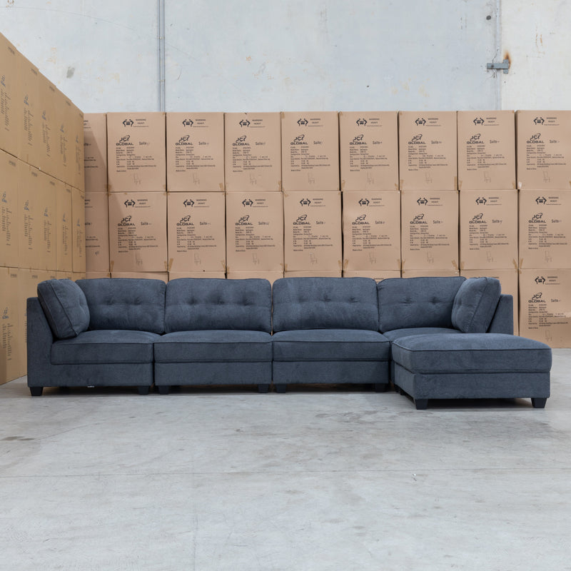 The Malta Modular Corner Lounge with Ottoman - Charcoal available to purchase from Warehouse Furniture Clearance at our next sale event.