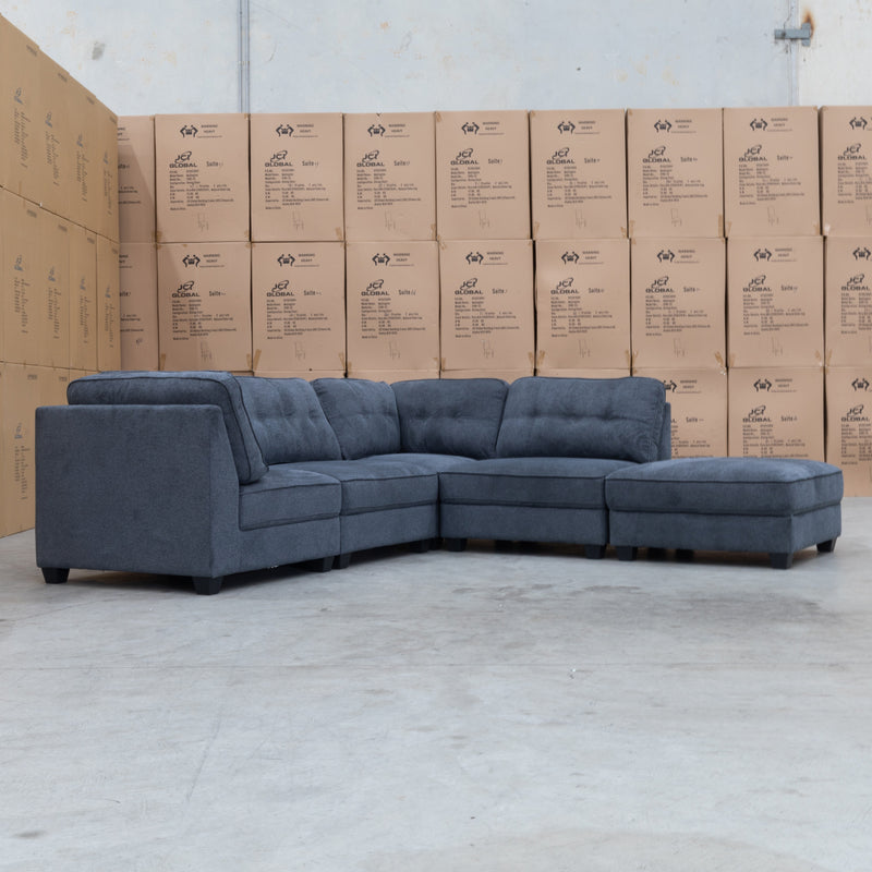 The Malta Modular Corner Lounge with Ottoman - Charcoal available to purchase from Warehouse Furniture Clearance at our next sale event.