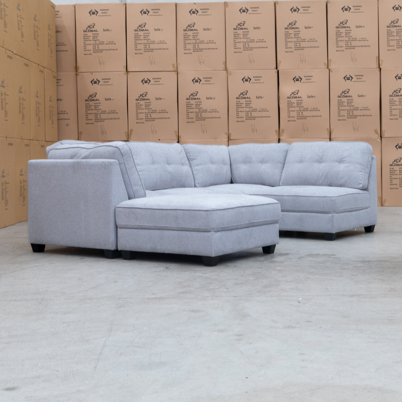 The Malta Modular Corner Lounge with Ottoman - Silver available to purchase from Warehouse Furniture Clearance at our next sale event.