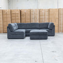 The Easton Modular Corner Lounge with Ottoman - Dark Grey available to purchase from Warehouse Furniture Clearance at our next sale event.