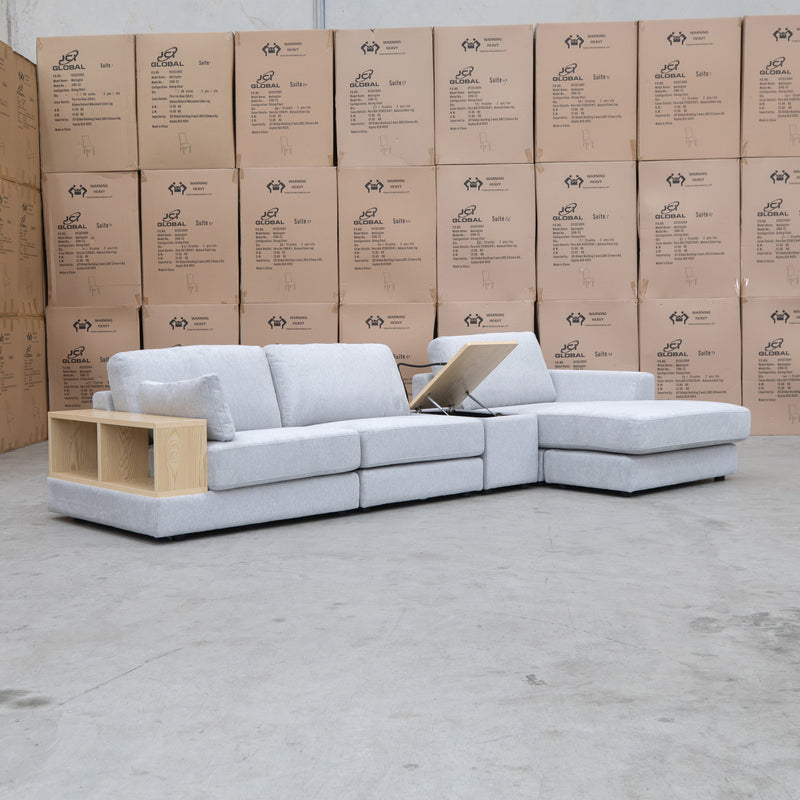 The Zenith Modular Reversible Chaise Lounge With Bookshelf - Whisper available to purchase from Warehouse Furniture Clearance at our next sale event.