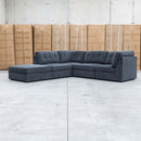 The Easton Modular Corner Lounge with Ottoman - Dark Grey available to purchase from Warehouse Furniture Clearance at our next sale event.