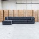 The Easton Modular Corner Lounge with Ottoman - Dark Grey available to purchase from Warehouse Furniture Clearance at our next sale event.