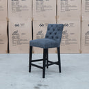 The Semillon Black Frame Upholstered Bar Stool - Charcoal available to purchase from Warehouse Furniture Clearance at our next sale event.