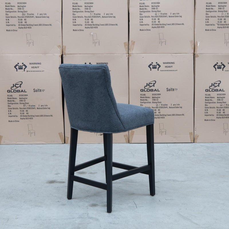 The Semillon Black Frame Upholstered Bar Stool - Charcoal available to purchase from Warehouse Furniture Clearance at our next sale event.