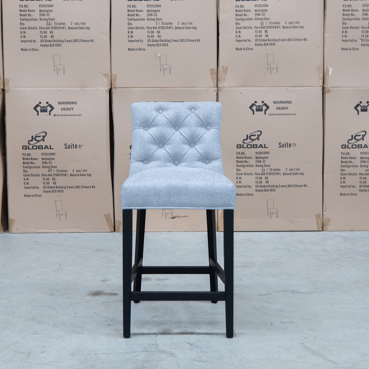 The Semillon Upholstered Black Frame Bar Stool - Silver available to purchase from Warehouse Furniture Clearance at our next sale event.