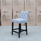 The Semillon Upholstered Black Frame Bar Stool - Silver available to purchase from Warehouse Furniture Clearance at our next sale event.