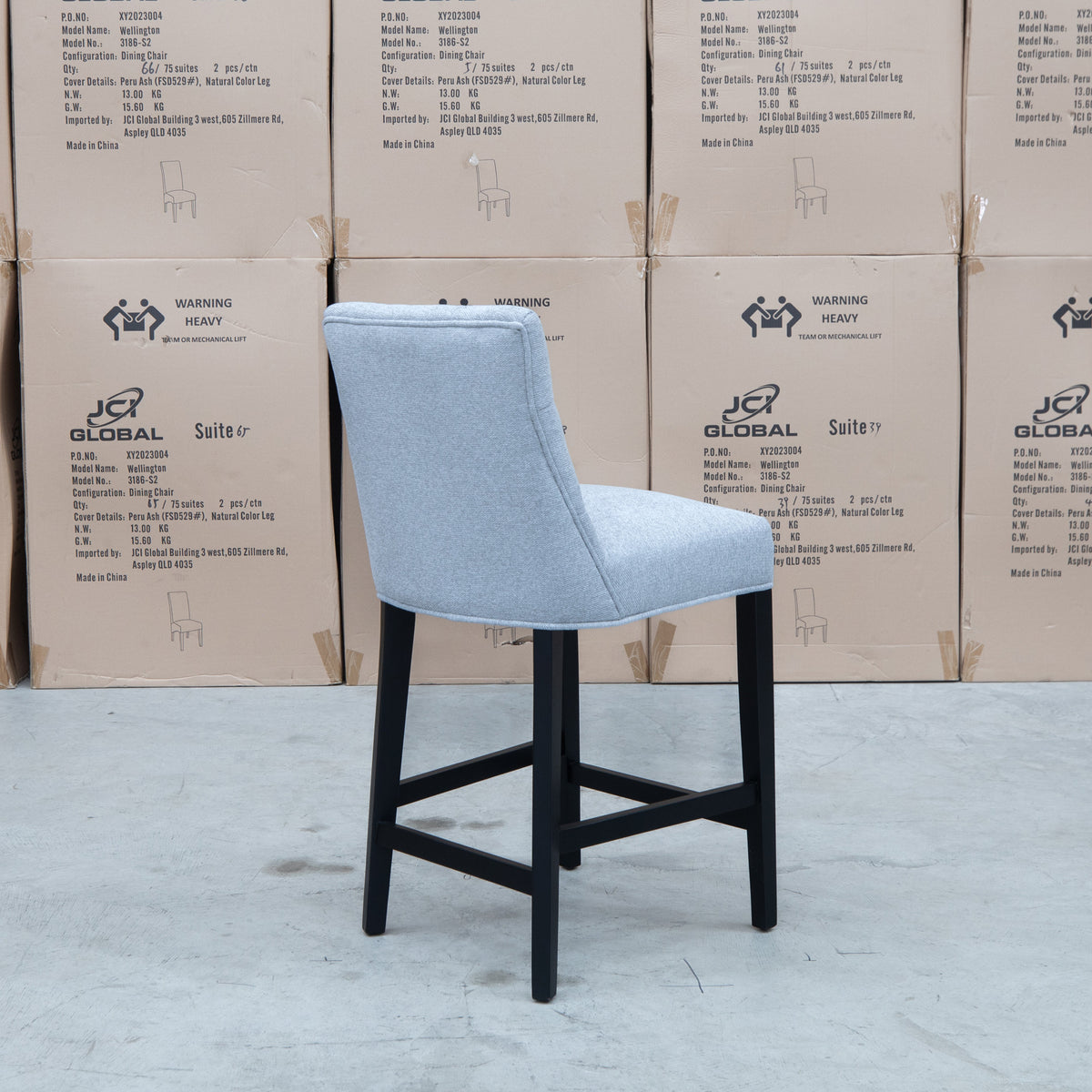 The Semillon Upholstered Black Frame Bar Stool - Silver available to purchase from Warehouse Furniture Clearance at our next sale event.