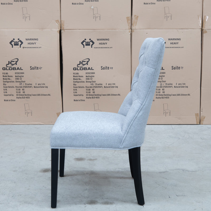 The Semillon Upholstered Black Frame Dining Chair - Silver available to purchase from Warehouse Furniture Clearance at our next sale event.