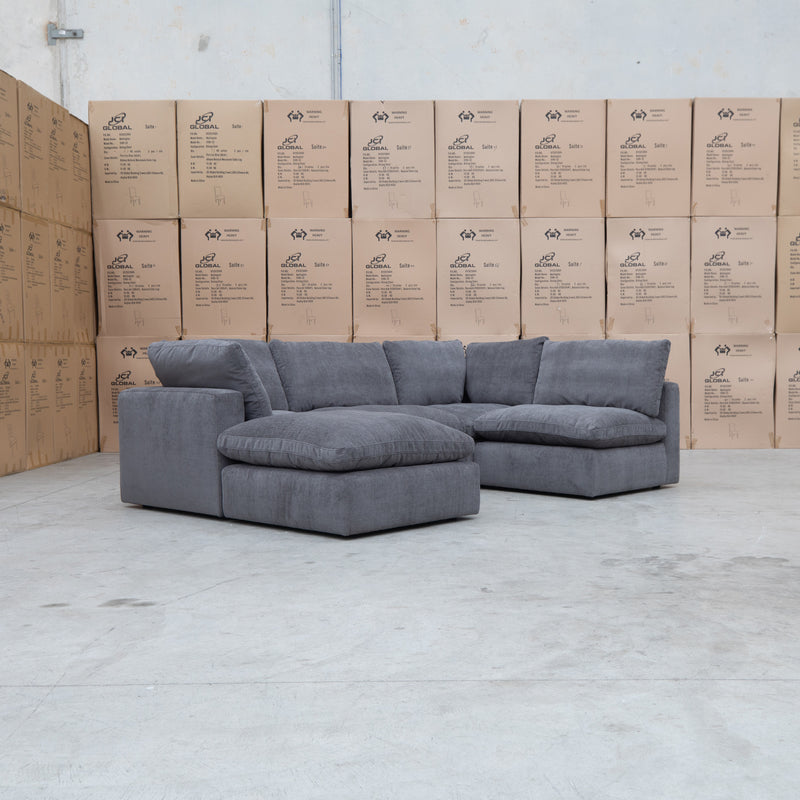 The Lupara Feather 5 Seat Modular Corner Chaise Lounge - Charcoal available to purchase from Warehouse Furniture Clearance at our next sale event.