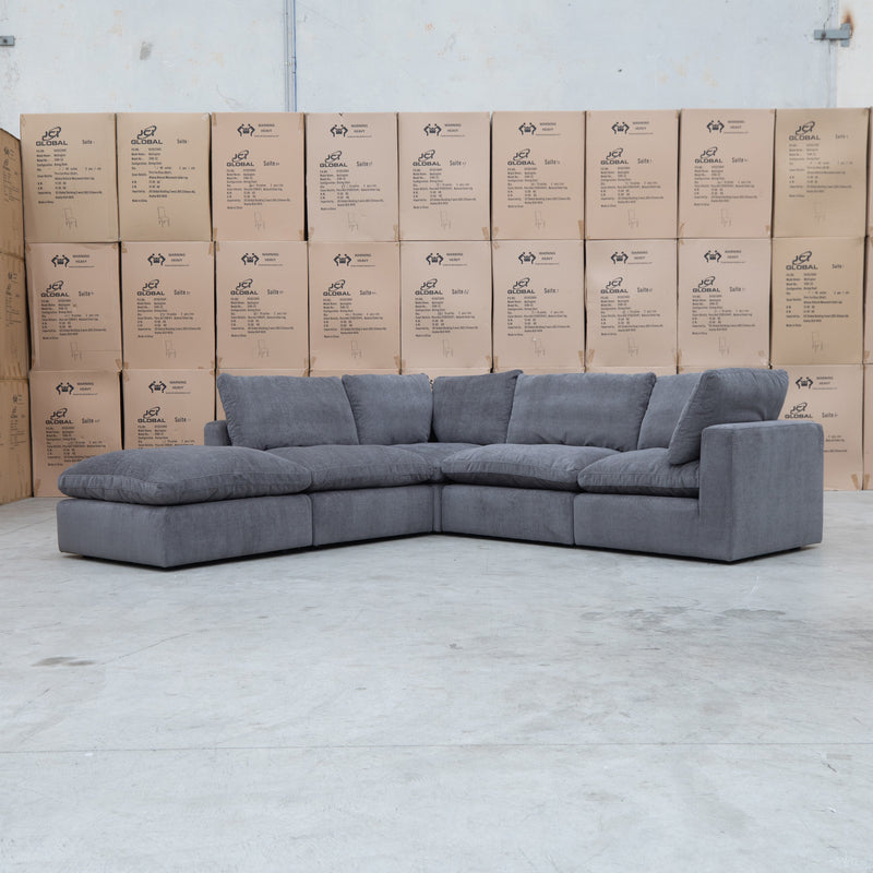 The Lupara Feather 5 Seat Modular Corner Chaise Lounge - Charcoal available to purchase from Warehouse Furniture Clearance at our next sale event.