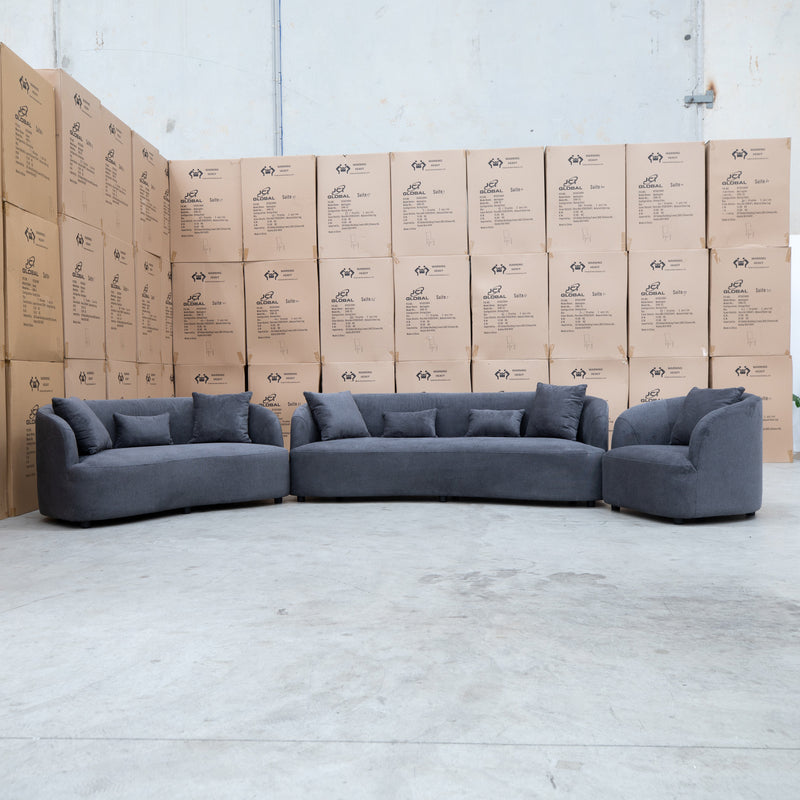 The Santorini Curved Two Seat Sofa - Shadow available to purchase from Warehouse Furniture Clearance at our next sale event.