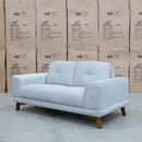 The Khloe Two Seat Fabric Sofa - Whisper available to purchase from Warehouse Furniture Clearance at our next sale event.