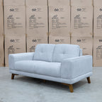 The Khloe Two Seat Fabric Sofa - Whisper available to purchase from Warehouse Furniture Clearance at our next sale event.