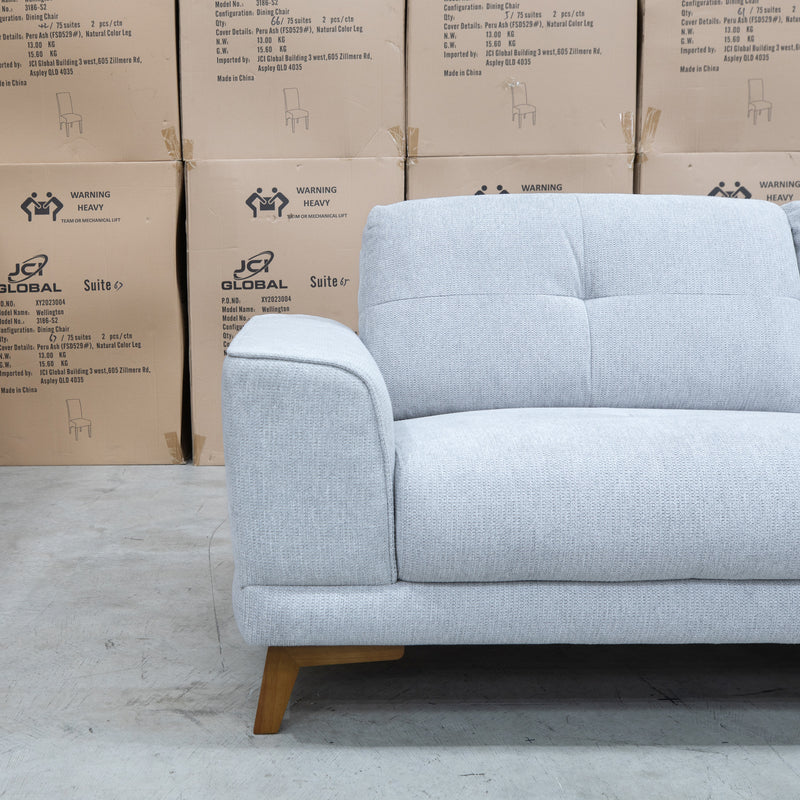 The Khloe Three Seat Fabric Sofa - Whisper available to purchase from Warehouse Furniture Clearance at our next sale event.