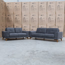 The Khloe Three Seat Fabric Sofa - Shadow available to purchase from Warehouse Furniture Clearance at our next sale event.