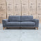 The Khloe Three Seat Fabric Sofa - Shadow available to purchase from Warehouse Furniture Clearance at our next sale event.