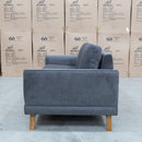 The Khloe Three Seat Fabric Sofa - Shadow available to purchase from Warehouse Furniture Clearance at our next sale event.