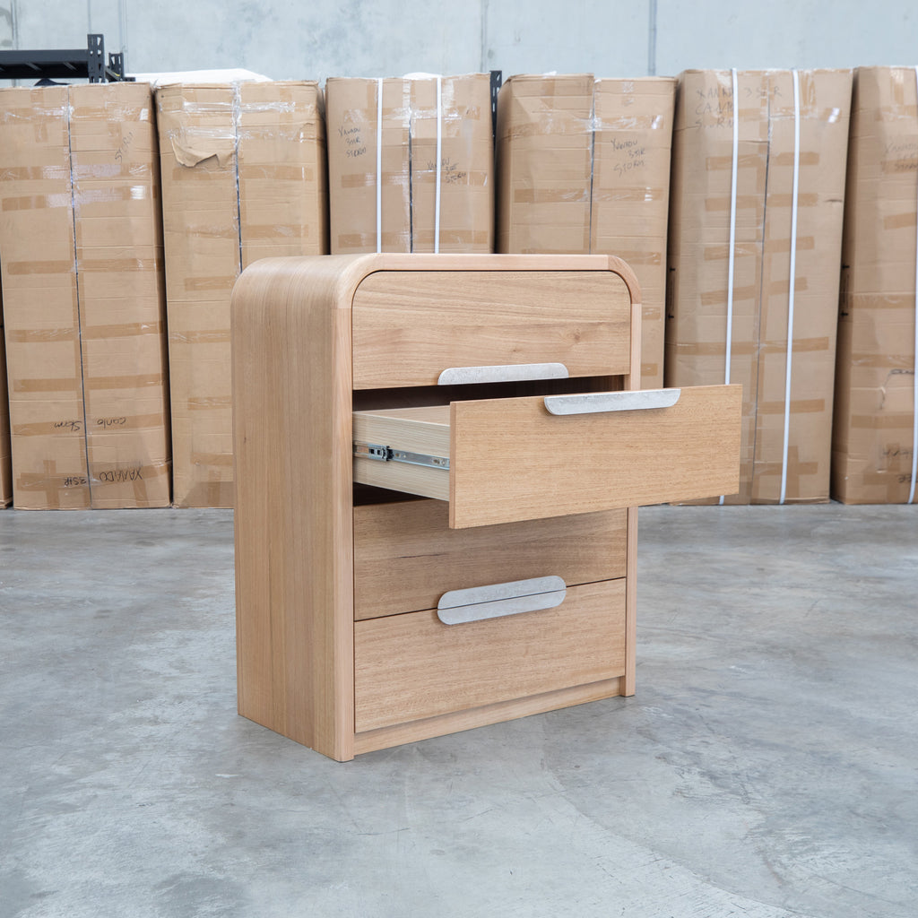 The Hastings Tasmanian Oak Four Drawer Tallboy available to purchase from Warehouse Furniture Clearance at our next sale event.