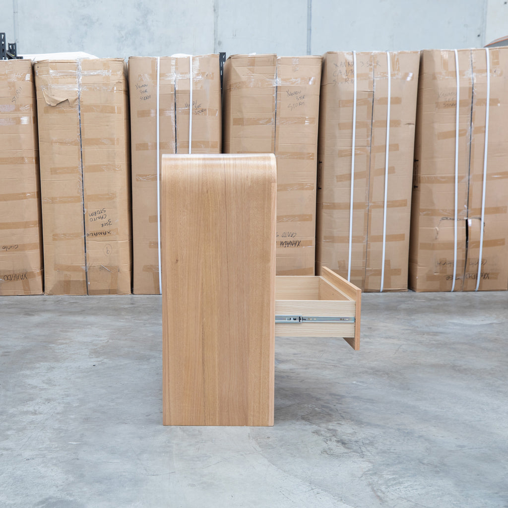 The Hastings Tasmanian Oak Four Drawer Tallboy available to purchase from Warehouse Furniture Clearance at our next sale event.
