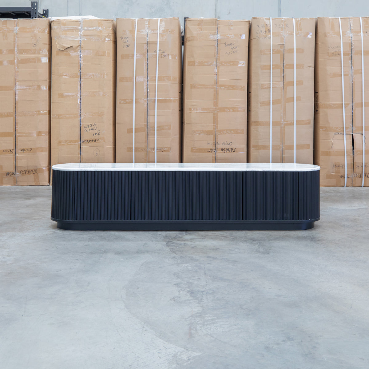 The Province 4 Door Entertainment Unit - Black & White Jazz Top available to purchase from Warehouse Furniture Clearance at our next sale event.