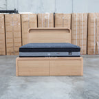The Hastings Tasmanian Oak King Gaslift Bed with Storage Drawers available to purchase from Warehouse Furniture Clearance at our next sale event.