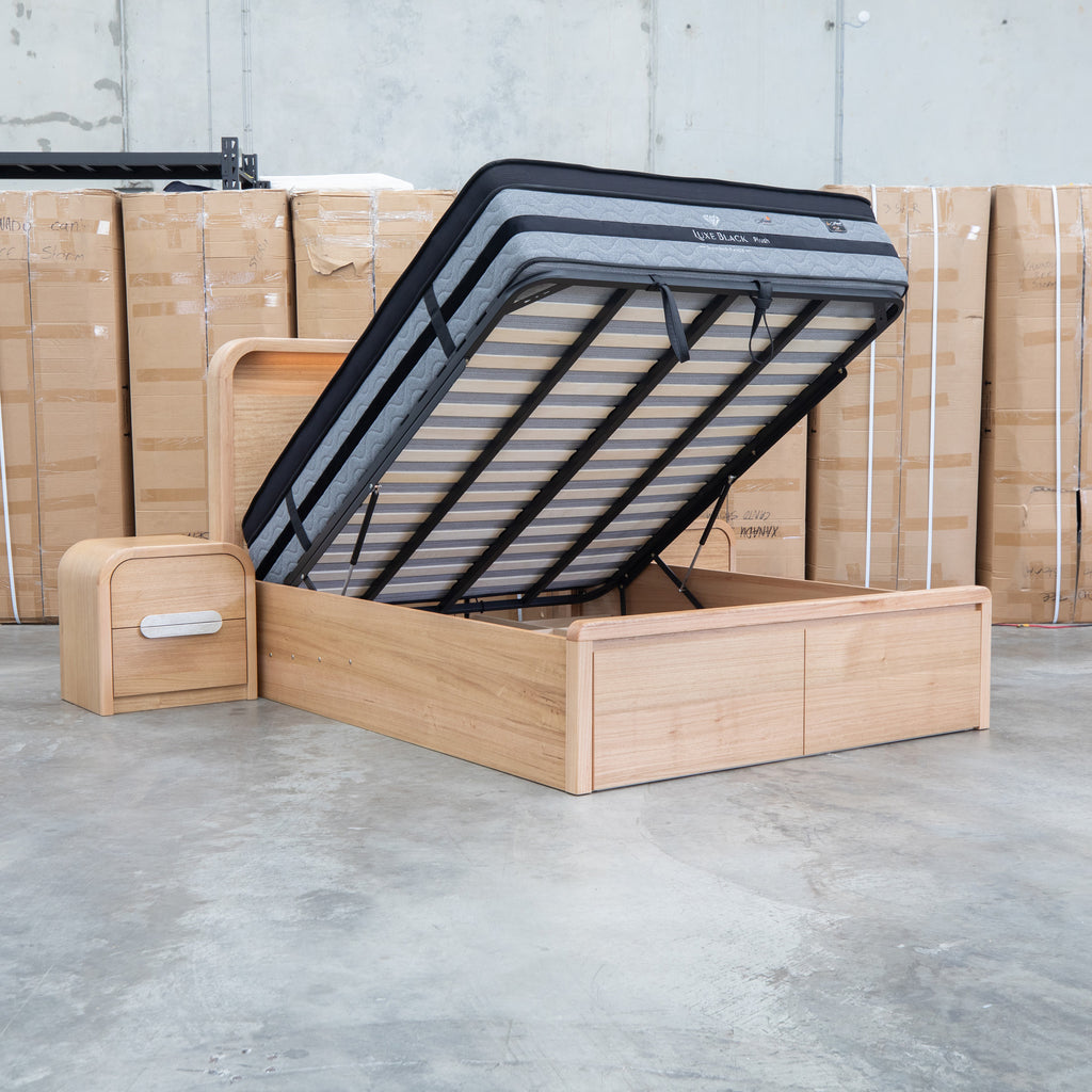 The Hastings Tasmanian Oak King Gaslift Bed with Storage Drawers available to purchase from Warehouse Furniture Clearance at our next sale event.