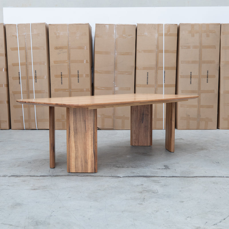 The Malbec 240cm Marri Timber Dining Table available to purchase from Warehouse Furniture Clearance at our next sale event.