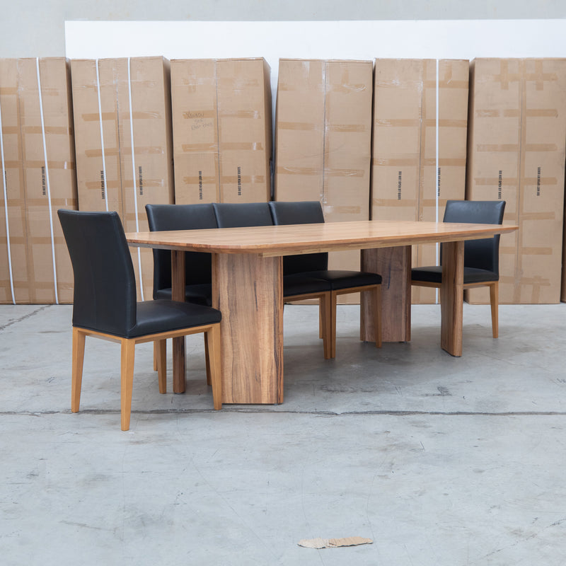 The Malbec 240cm Marri Timber Dining Table available to purchase from Warehouse Furniture Clearance at our next sale event.