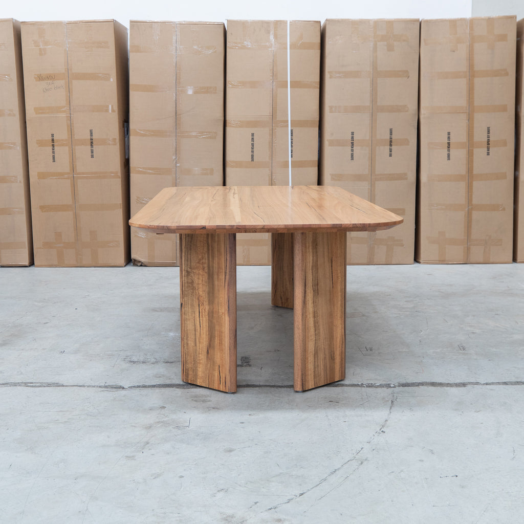 The Malbec 240cm Marri Timber Dining Table available to purchase from Warehouse Furniture Clearance at our next sale event.