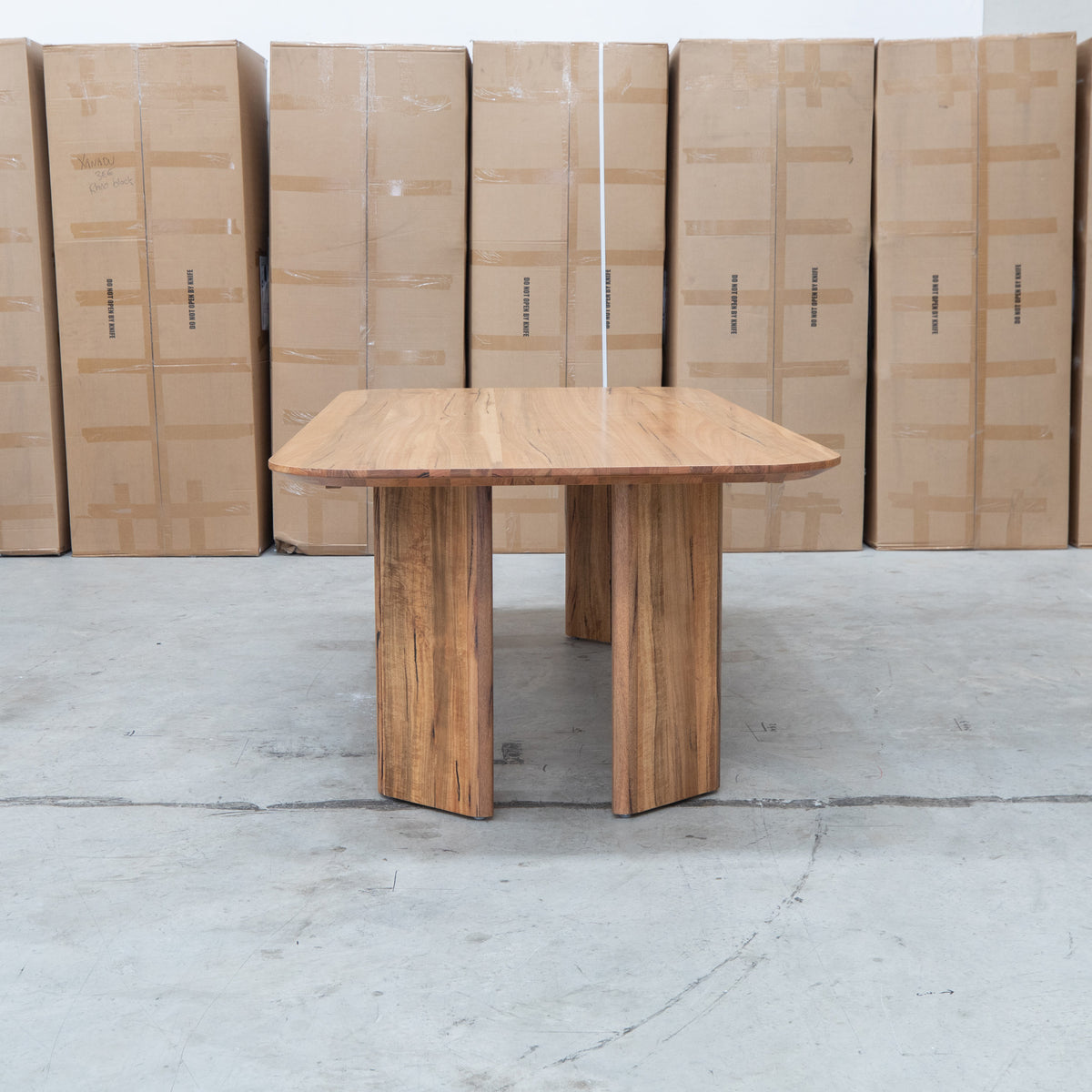 The Malbec 240cm Marri Timber Dining Table available to purchase from Warehouse Furniture Clearance at our next sale event.