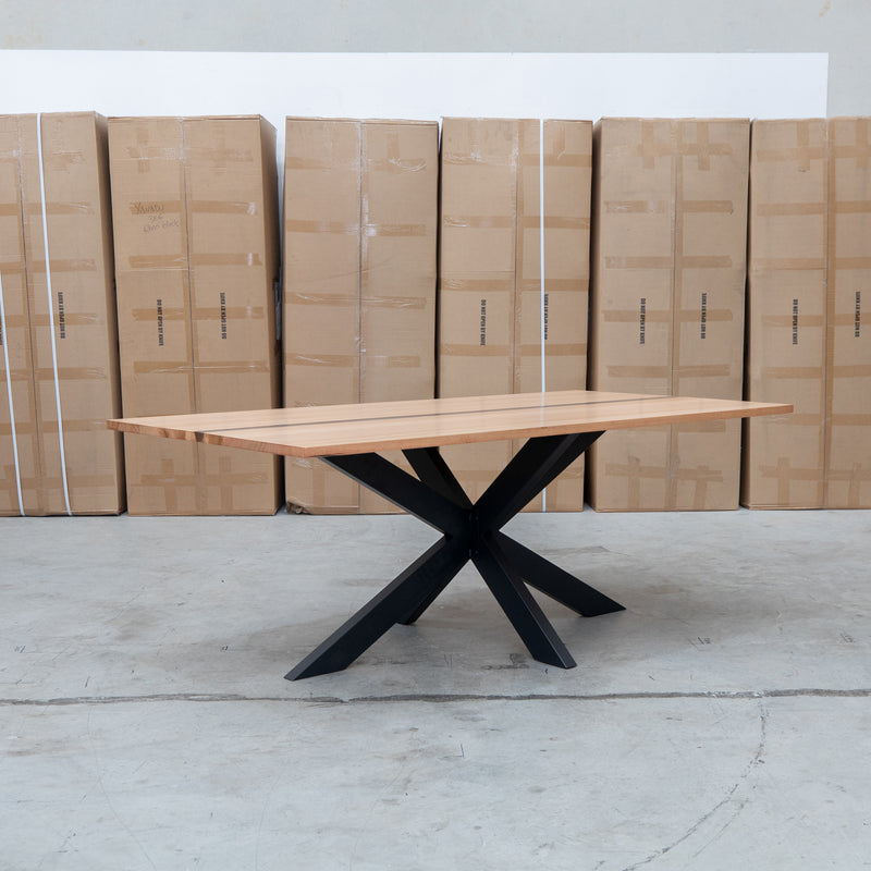 The Maverick 210cm Dining Table with Resin Insert available to purchase from Warehouse Furniture Clearance at our next sale event.