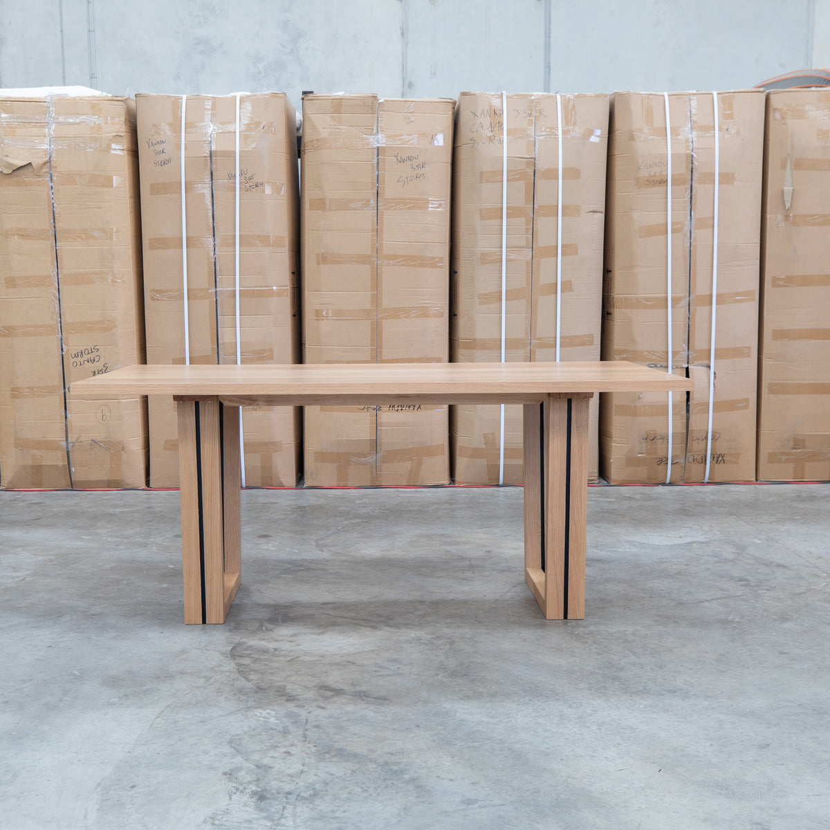 The Crete White Oak Hardwood 210cm Dining Table available to purchase from Warehouse Furniture Clearance at our next sale event.