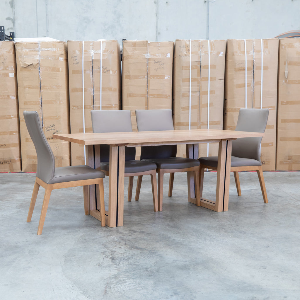 The Crete White Oak Hardwood 180cm Dining Table available to purchase from Warehouse Furniture Clearance at our next sale event.