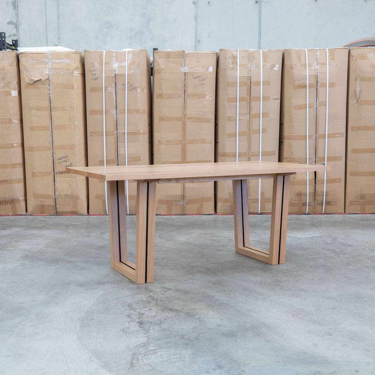 The Crete White Oak Hardwood 180cm Dining Table available to purchase from Warehouse Furniture Clearance at our next sale event.