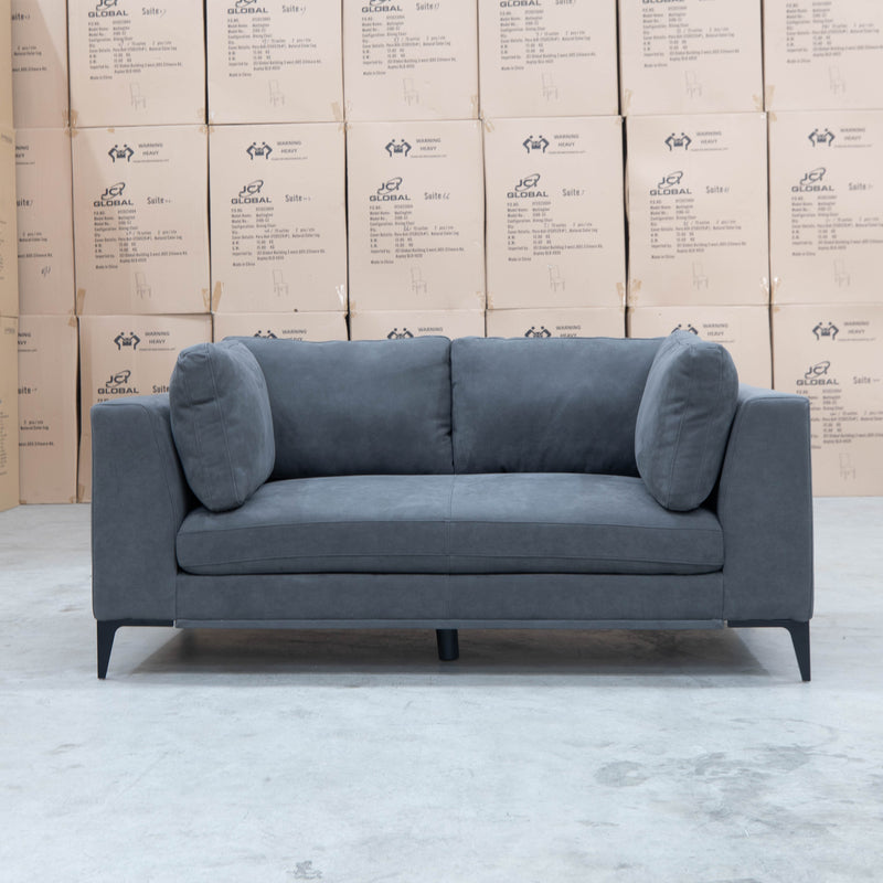 The Alara Two Seat Fabric Lounge - Grey available to purchase from Warehouse Furniture Clearance at our next sale event.