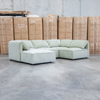 The Sienna Feather & Foam Modular Corner Lounge with Ottoman - Pistachio available to purchase from Warehouse Furniture Clearance at our next sale event.