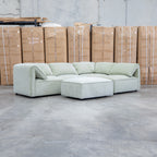 The Sienna Feather & Foam Modular Corner Lounge with Ottoman - Pistachio available to purchase from Warehouse Furniture Clearance at our next sale event.