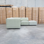 The Sienna Feather & Foam Modular Corner Lounge with Ottoman - Pistachio available to purchase from Warehouse Furniture Clearance at our next sale event.