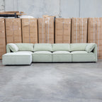 The Sienna Feather & Foam Modular Corner Lounge with Ottoman - Pistachio available to purchase from Warehouse Furniture Clearance at our next sale event.