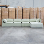 The Sienna Feather & Foam Modular Corner Lounge with Ottoman - Pistachio available to purchase from Warehouse Furniture Clearance at our next sale event.