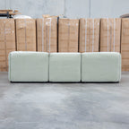The Sienna Feather & Foam Modular Corner Lounge with Ottoman - Pistachio available to purchase from Warehouse Furniture Clearance at our next sale event.