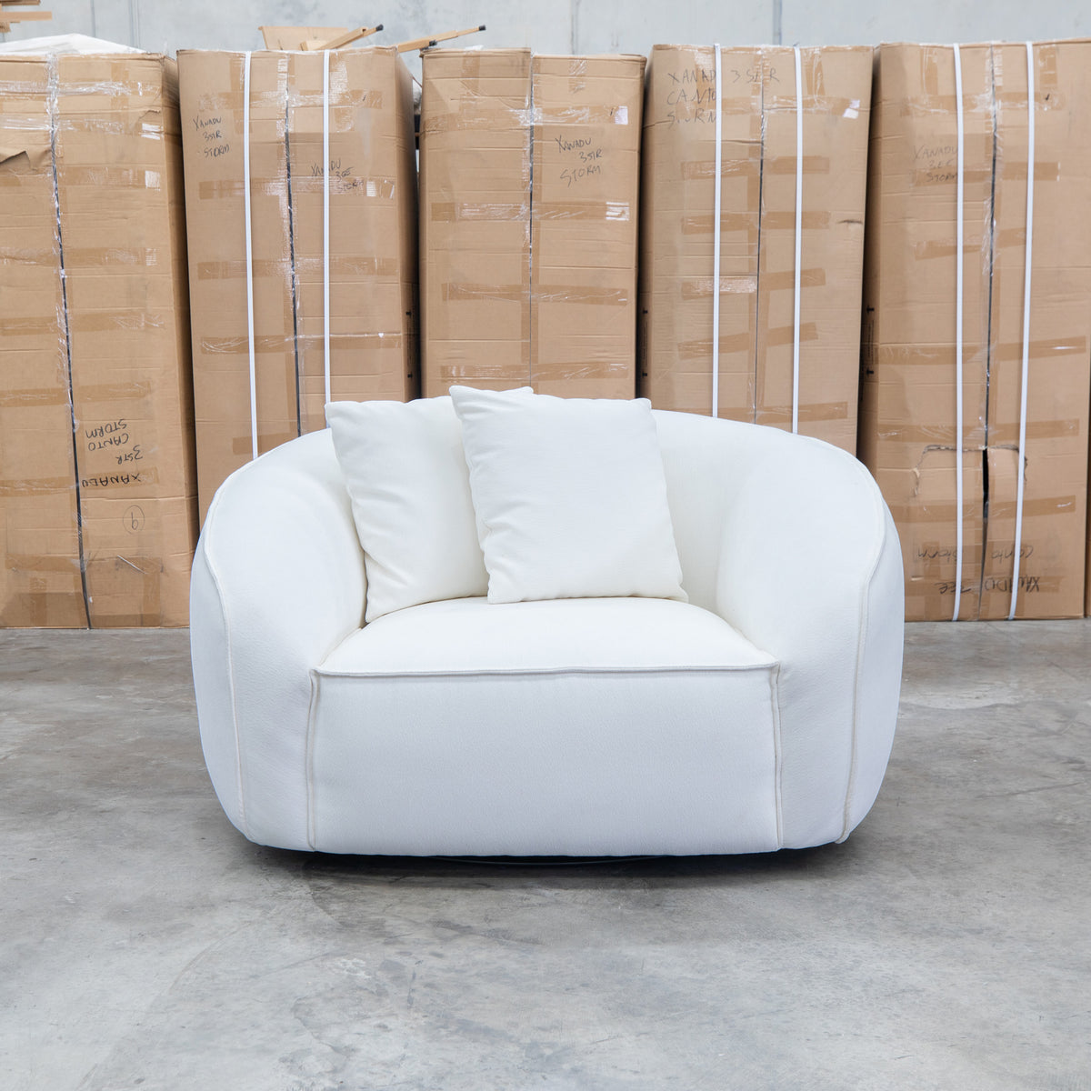 The Sienna Oversized Swivel Chair - Snow Veda available to purchase from Warehouse Furniture Clearance at our next sale event.
