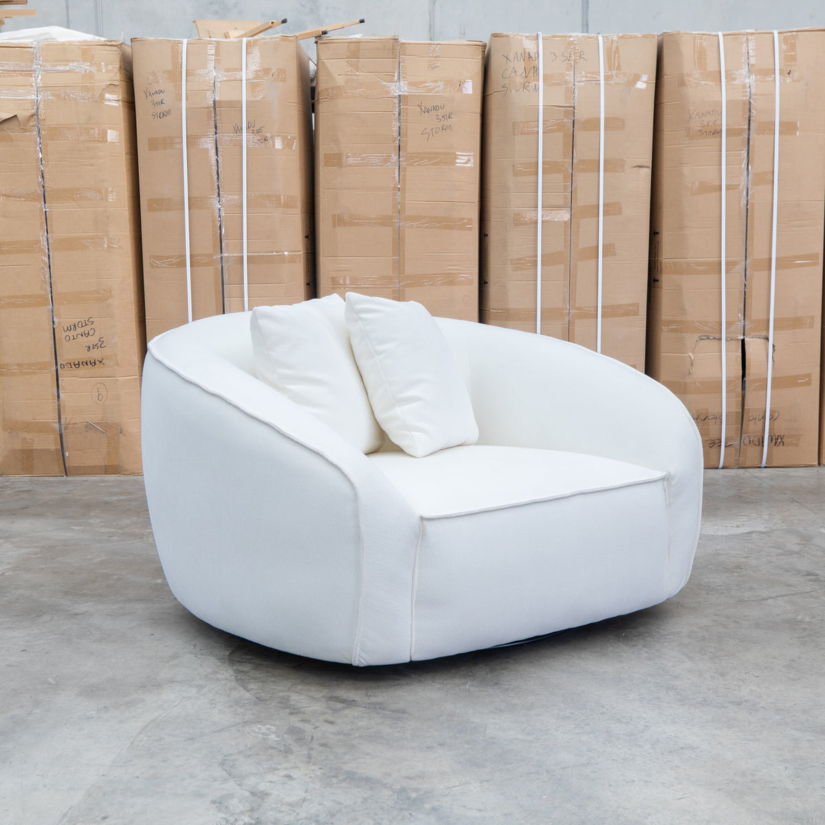 The Sienna Oversized Swivel Chair - Snow Veda available to purchase from Warehouse Furniture Clearance at our next sale event.