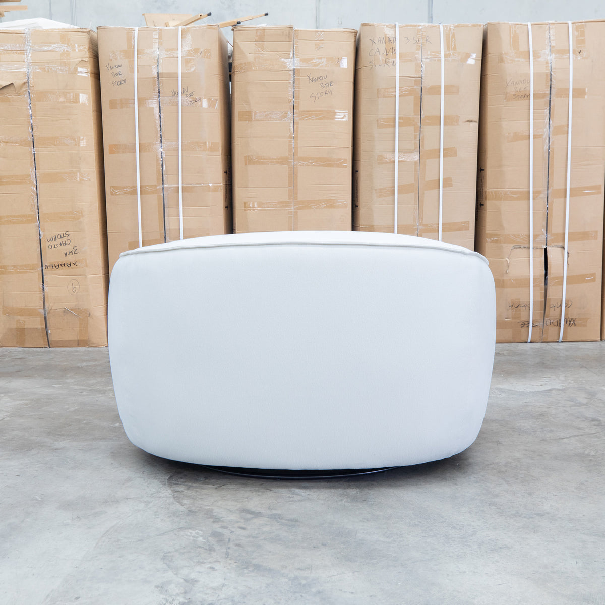 The Sienna Oversized Swivel Chair - Snow Veda available to purchase from Warehouse Furniture Clearance at our next sale event.