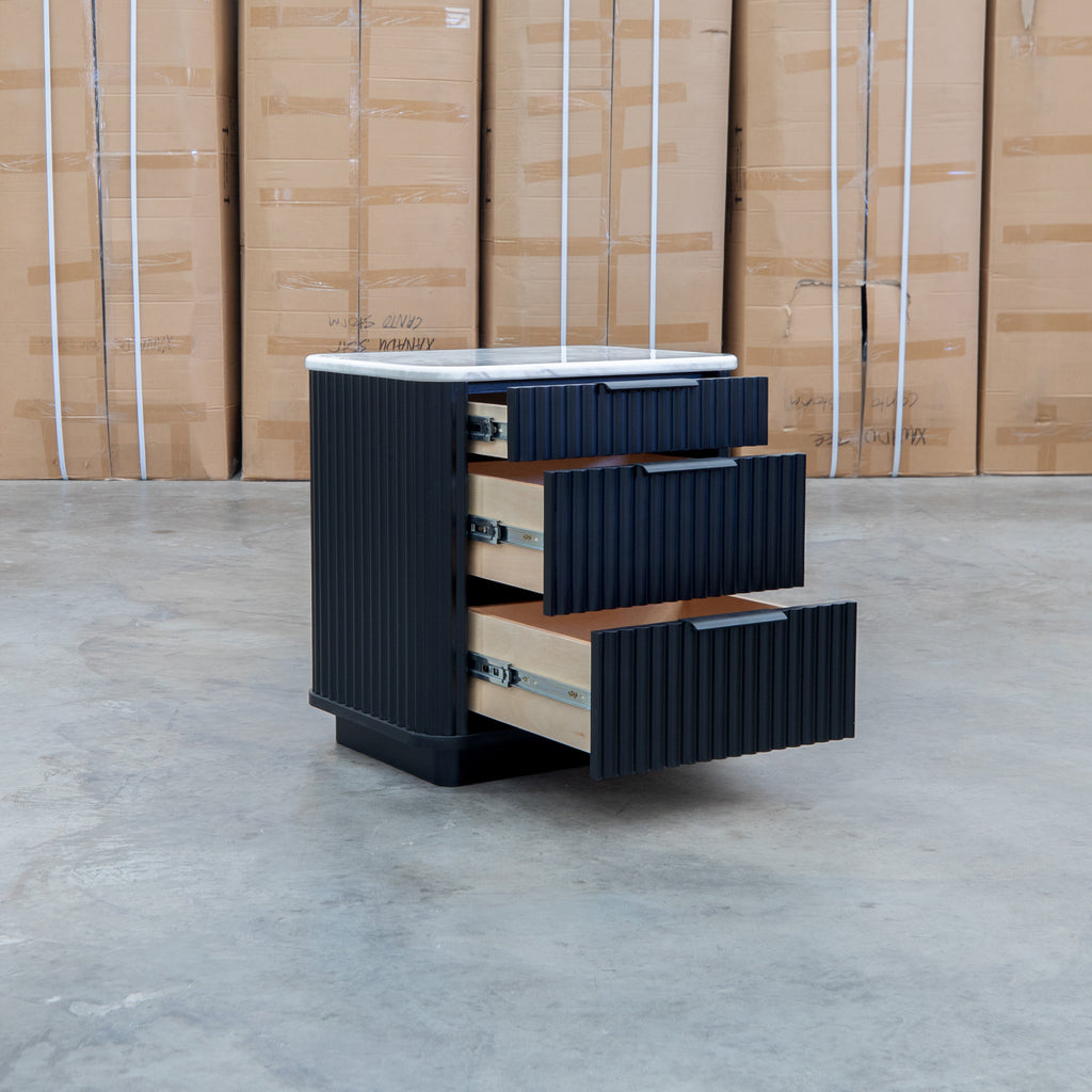 The Province Three Drawer Bedside - Black & White Jazz Top available to purchase from Warehouse Furniture Clearance at our next sale event.