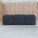 The Nobu Modular Corner Lounge with Ottoman - Charcoal - Available After 15th November available to purchase from Warehouse Furniture Clearance at our next sale event.