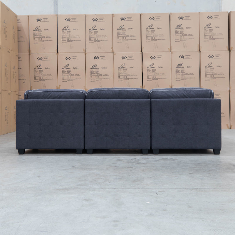 The Nobu Modular Corner Lounge with Ottoman - Charcoal - Available After 15th November available to purchase from Warehouse Furniture Clearance at our next sale event.